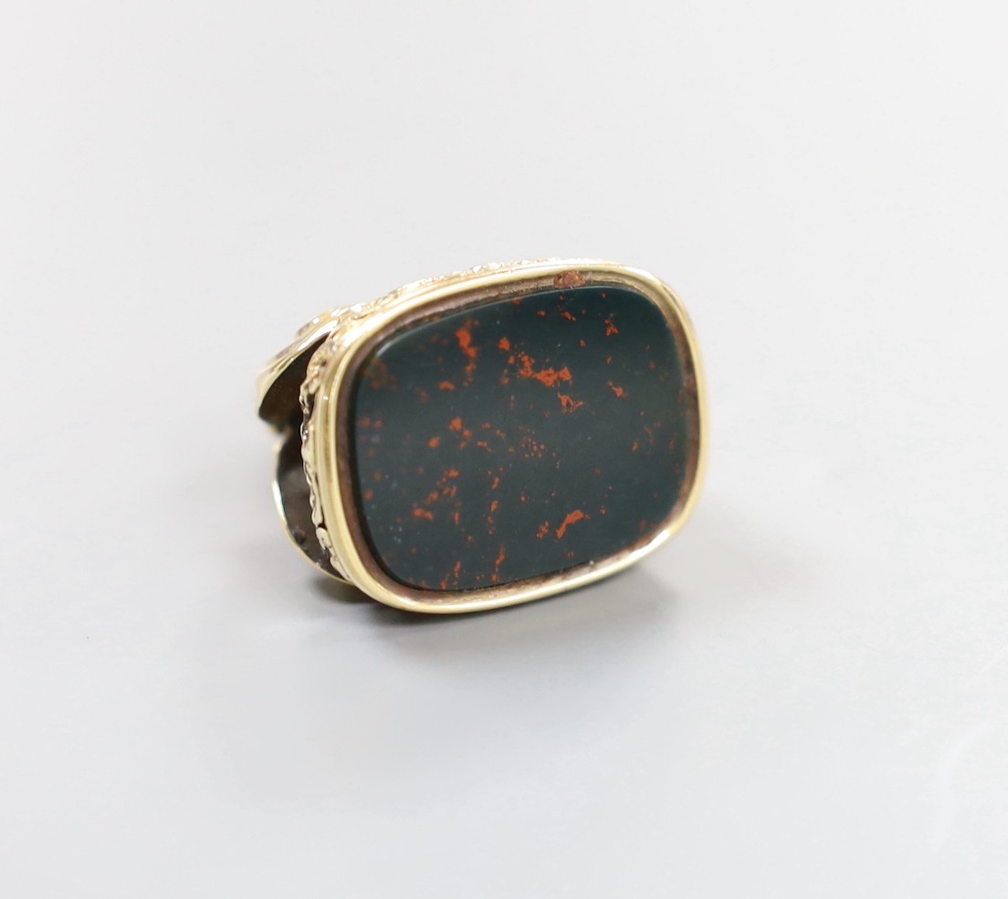 A 19th century yellow metal overlaid and bloodstone set fob seal, 31mm.